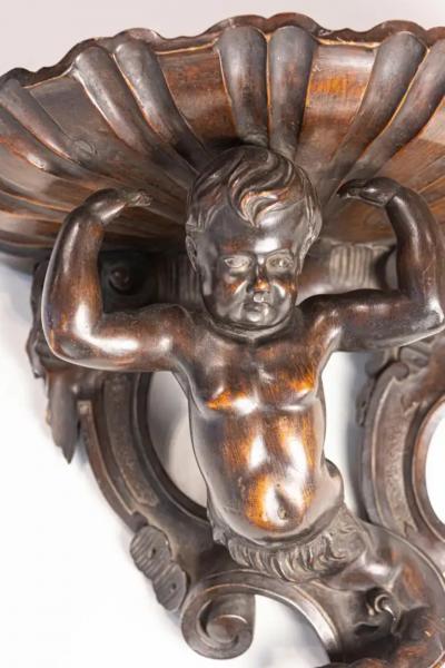 Italian Baroque Style Late 19th Century Fruitwood Wall Bracket with Carved Putto