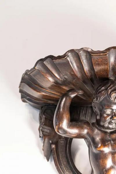 Italian Baroque Style Late 19th Century Fruitwood Wall Bracket with Carved Putto
