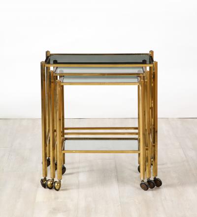 Italian Brass and Smoked Glass Nesting Tables Italy circa 1960