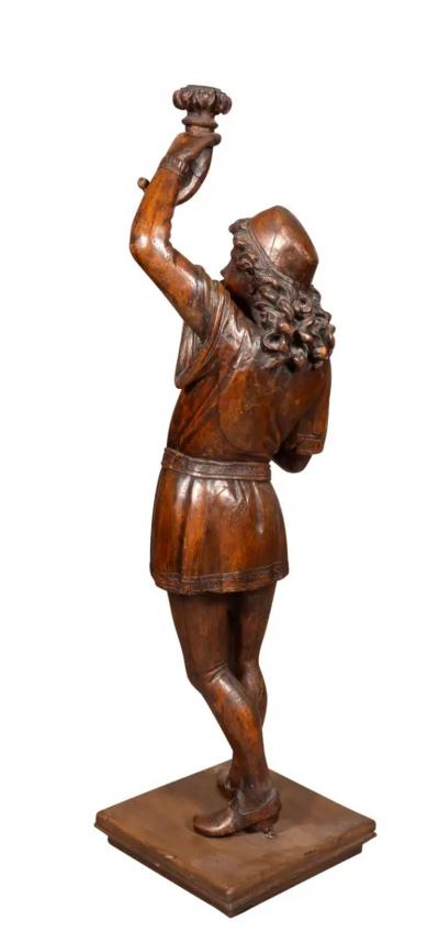 Italian Carved Walnut Torchere Of A Standing Boy Holding A Torch