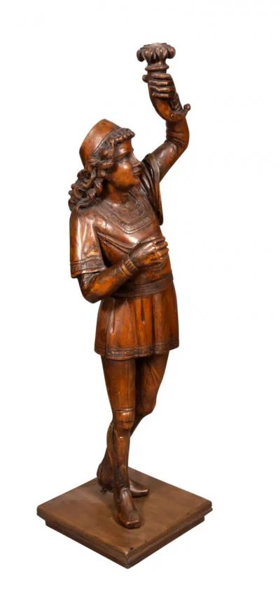 Italian Carved Walnut Torchere Of A Standing Boy Holding A Torch