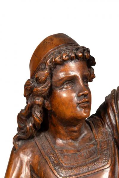 Italian Carved Walnut Torchere Of A Standing Boy Holding A Torch