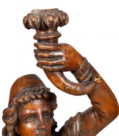 Italian Carved Walnut Torchere Of A Standing Boy Holding A Torch