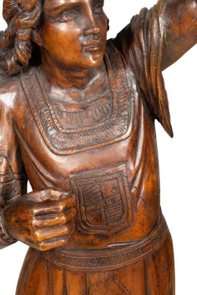 Italian Carved Walnut Torchere Of A Standing Boy Holding A Torch