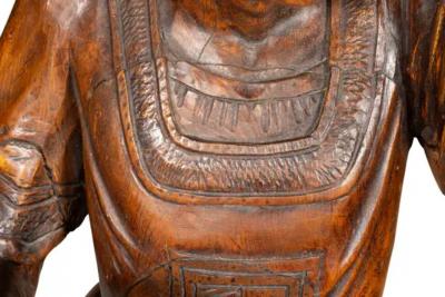 Italian Carved Walnut Torchere Of A Standing Boy Holding A Torch
