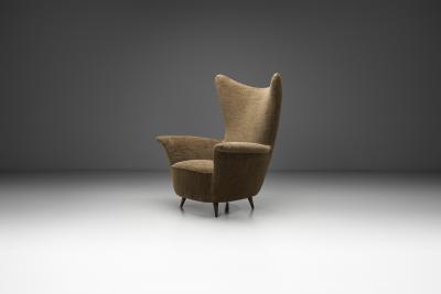 Italian Mid Century Modern Peaked Wingback Armchair Italy ca 1950s