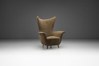 Italian Mid Century Modern Peaked Wingback Armchair Italy ca 1950s