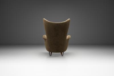 Italian Mid Century Modern Peaked Wingback Armchair Italy ca 1950s