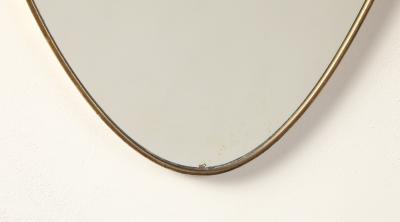 Italian Mid Century Shield Form Brass Mirror with Shell Crest circa 1950