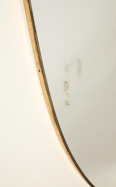 Italian Mid Century Shield Form Brass Mirror with Shell Crest circa 1950