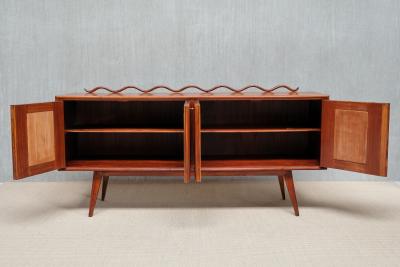 Italian Modern Walnut and Leather Sideboard with Undulating Cornice 1950s