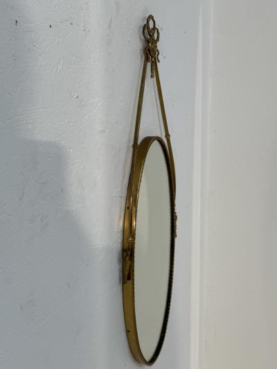 Italian Neoclassical Oval Mirror with Brass Ribbon and Tassel Detailing 1950s