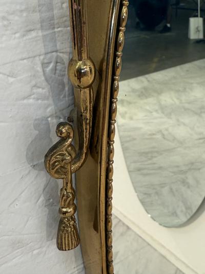Italian Neoclassical Oval Mirror with Brass Ribbon and Tassel Detailing 1950s