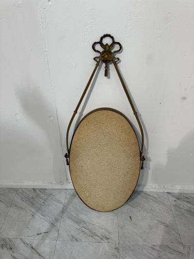 Italian Neoclassical Oval Mirror with Brass Ribbon and Tassel Detailing 1950s
