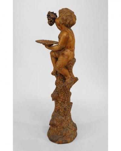Italian Renaissance style stripped pedestal with cupid holding grapes