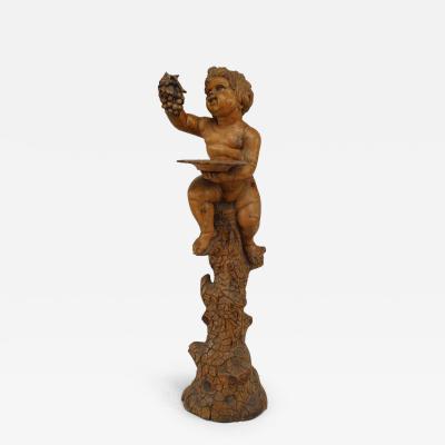 Italian Renaissance style stripped pedestal with cupid holding grapes