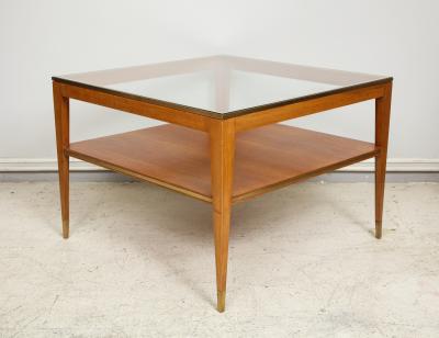 Italian Two Tiered Cocktail Table with Bronze Trim on Tapered Legs