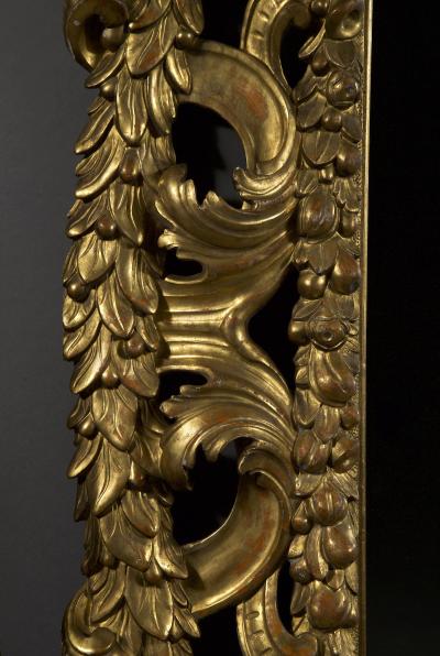 Italian late Neoclassical style giltwood mirror with unusual laurel encirclement
