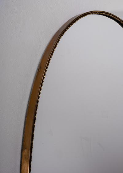 Italian oval brass mirror with beaded decoration