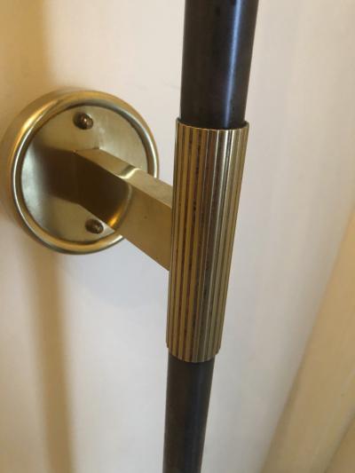 Italian stunning gold bronze and patinated iron pair of long torch sconces
