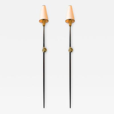 Italian stunning gold bronze and patinated iron pair of long torch sconces