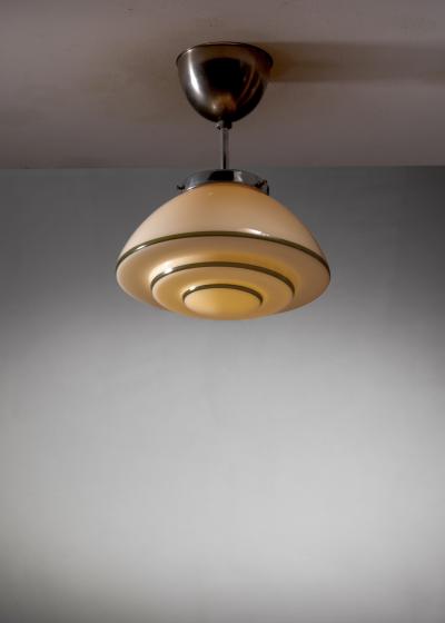 Ivory and green glass pendant