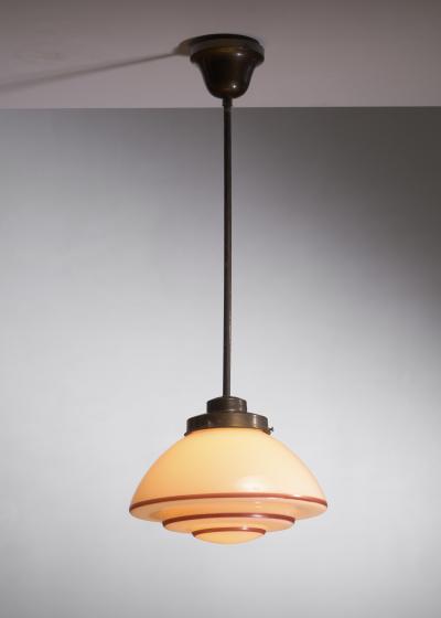 Ivory and red glass pendant