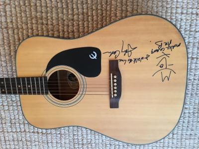 JOHNNY CASH AND BONO AUTOGRAPHED ACOUSTIC GIBSON GUITAR