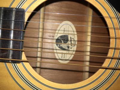 JOHNNY CASH AND BONO AUTOGRAPHED ACOUSTIC GIBSON GUITAR