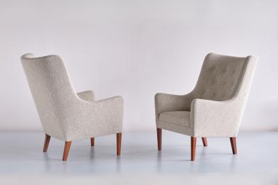 Jacob Kj r Jacob Kjaer Pair of Jacob Kj r High Back Armchairs in Boucl and Mahogany Denmark 1940s