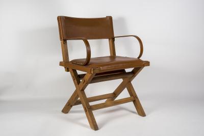 Jacques Adnet 1950s Pair of Stitched leather armchairs By Jacques Adnet