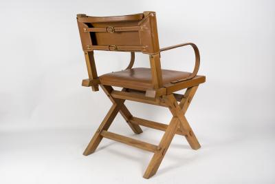 Jacques Adnet 1950s Pair of Stitched leather armchairs By Jacques Adnet