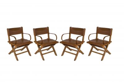 Jacques Adnet 1950s Pair of Stitched leather armchairs By Jacques Adnet