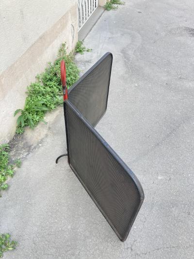 Jacques Adnet 1950s Stitched leather and m tal fire screen by Jacques Adnet