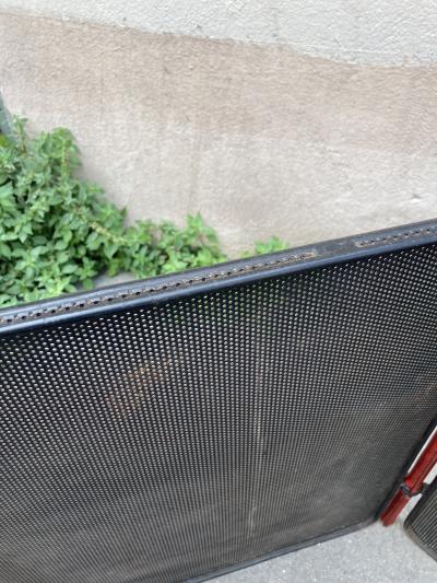 Jacques Adnet 1950s Stitched leather and m tal fire screen by Jacques Adnet