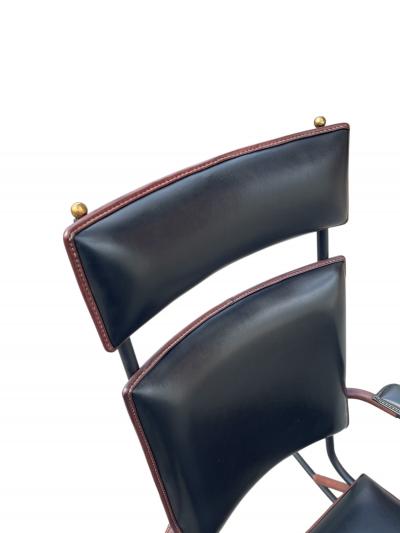 Jacques Adnet 1950s Stitched leather and m tal rocking chair by Jacques Adnet