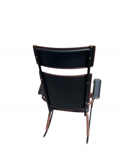 Jacques Adnet 1950s Stitched leather and m tal rocking chair by Jacques Adnet
