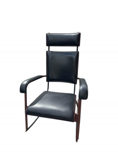 Jacques Adnet 1950s Stitched leather and m tal rocking chair by Jacques Adnet