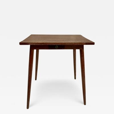 Jacques Adnet 1950s Stitched leather and oak table by Jacques Adnet