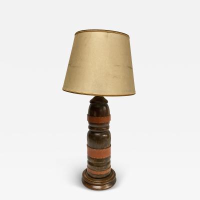 Jacques Adnet 1950s Stitched leather and oak table lamp by Jacques adnet