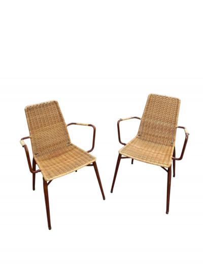Jacques Adnet 1950s Stitched leather and rattan armchairs by Jacques ADNET
