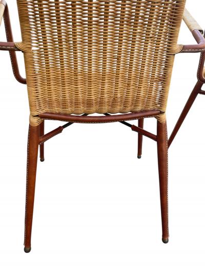 Jacques Adnet 1950s Stitched leather and rattan armchairs by Jacques ADNET