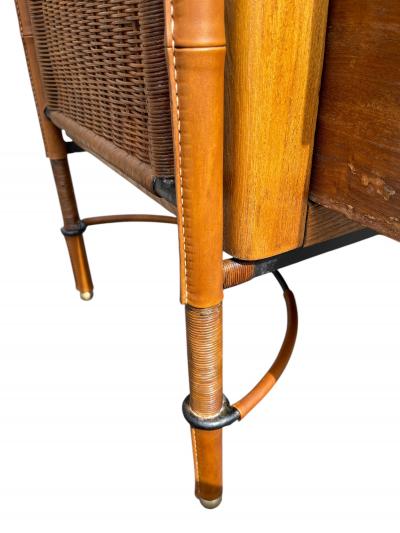Jacques Adnet 1950s Stitched leather and rattan chest of drawers by Jacques Adnet