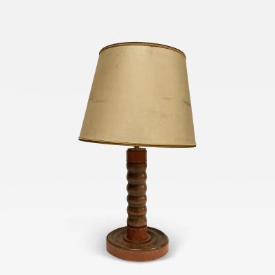 Jacques Adnet 1950s Stitched leather and wood lamp by Jacques adnet