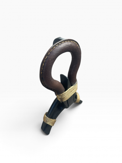 Jacques Adnet 1950s Stitched leather andirons by Jacques Adnet