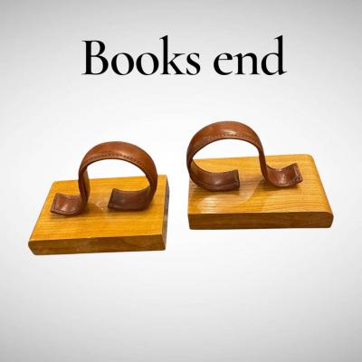 Jacques Adnet 1950s Stitched leather books end by Jacques Adnet