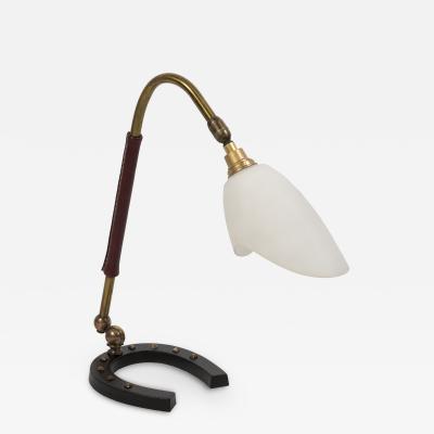 Jacques Adnet 1950s Stitched leather lamp with shoe horse base by Jacques Adnet