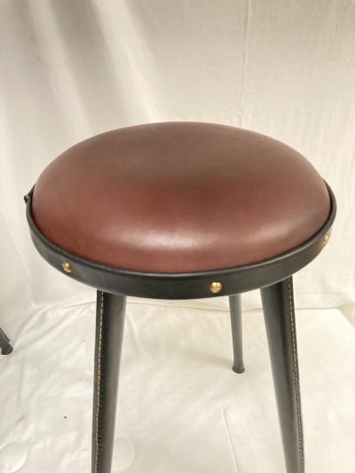 Jacques Adnet 1950s Stitched leather pair of stools By Jacques Adnet