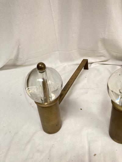 Jacques Adnet 1950s cristal ball andirons in the style of Jacques Adnet