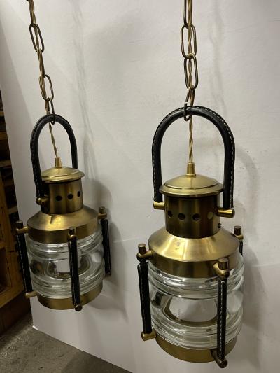 Jacques Adnet 1950s pair of stitched leather lanterns by Jacques Adnet